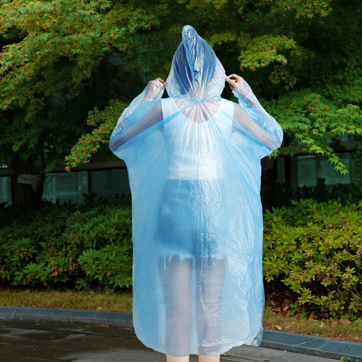 Clear rain coat for keeping clean and dry in wet conditions