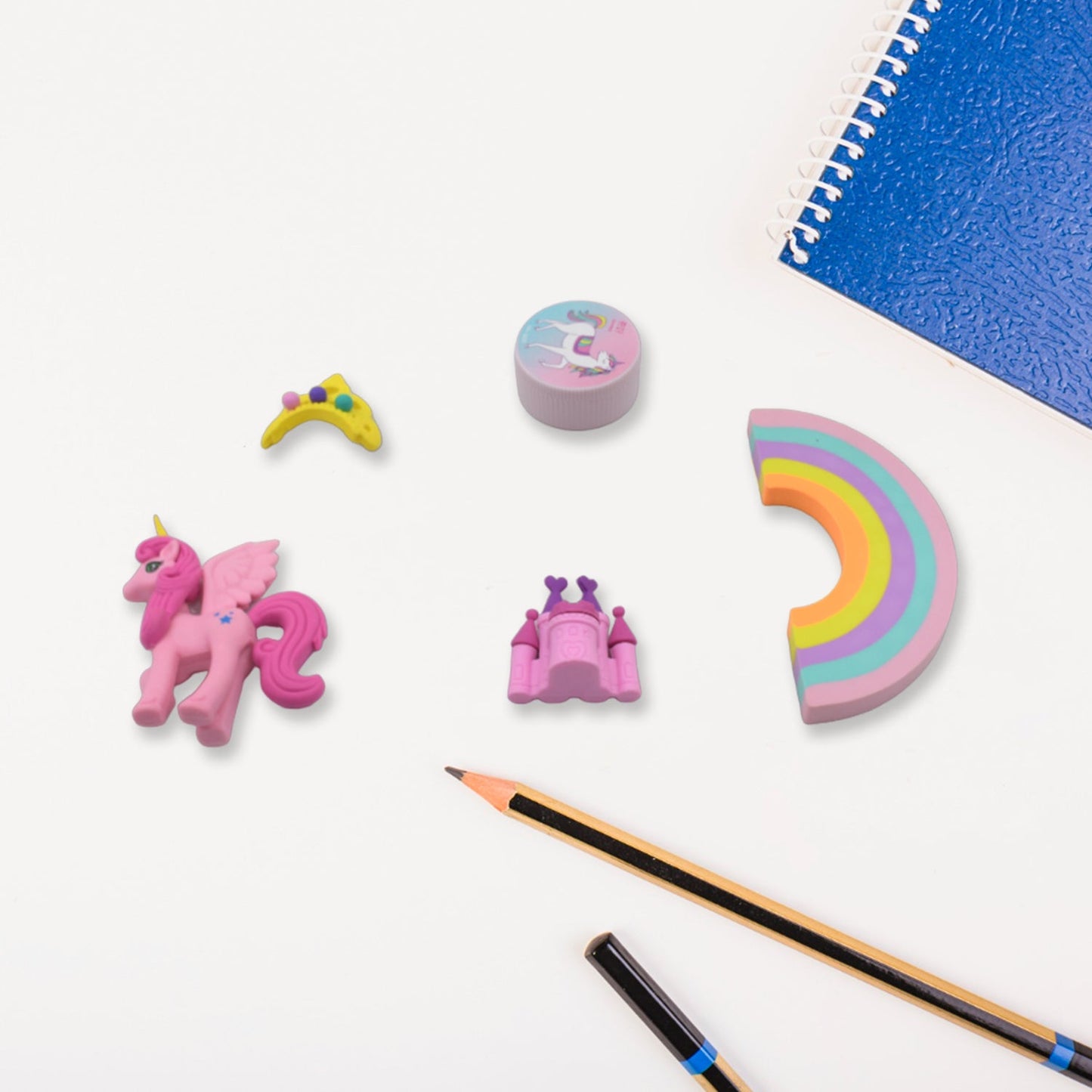 Fun unicorn stationery set featuring a diary, pencils, sharpener, and erasers for kids.