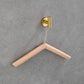 Wooden hangers for suits and coats