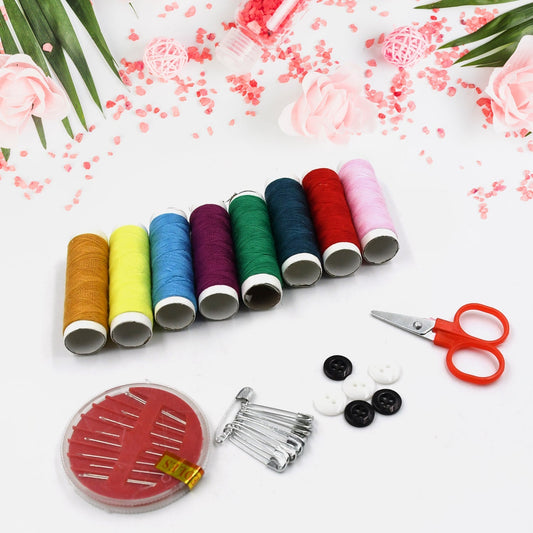 Travel sewing kit with double layers, featuring colored threads and essential sewing tools.