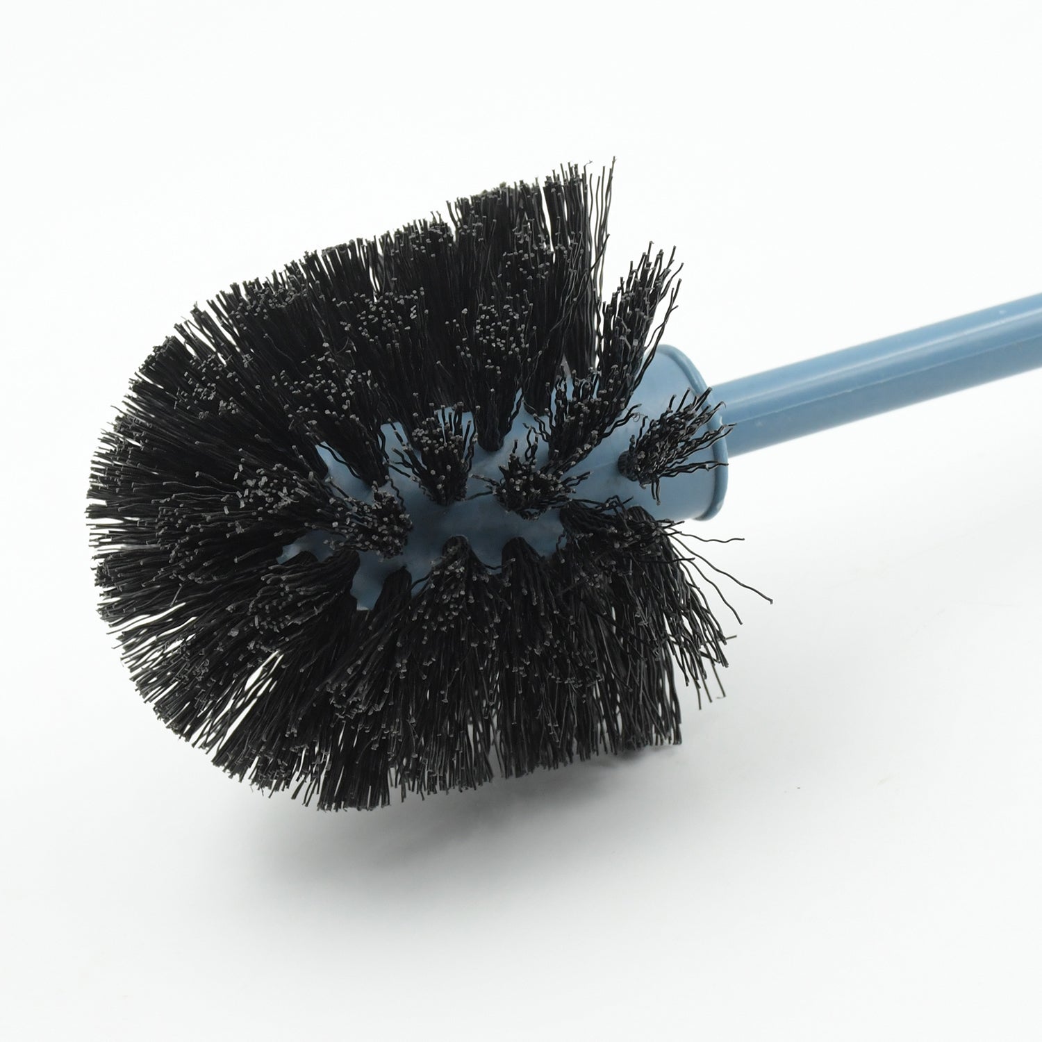 Round toilet brush in holder for neat storage