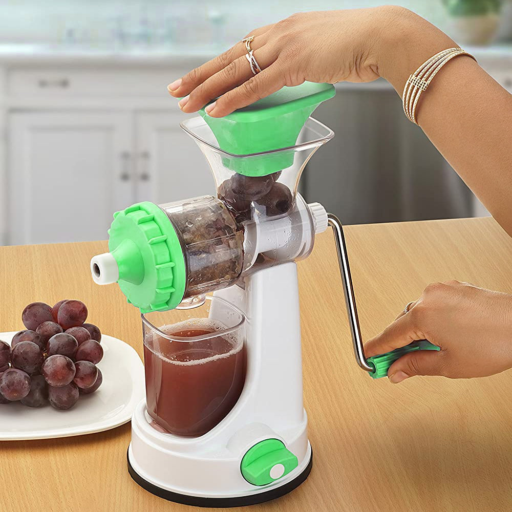 Fruit juicer with ergonomic steel handle for ease of use.