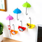 Umbrella-shaped key holder in bright colors