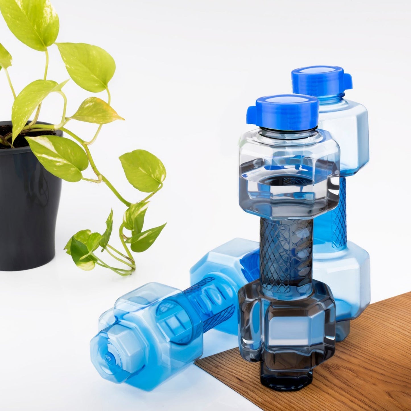 Sturdy plastic water bottle in dumbbell shape