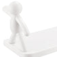 Wall-mounted shelf with human figurine