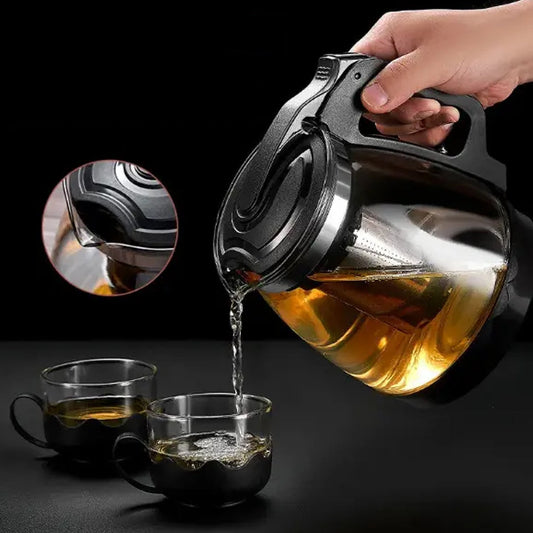 Flame proof glass kettle set with four cups and strainer