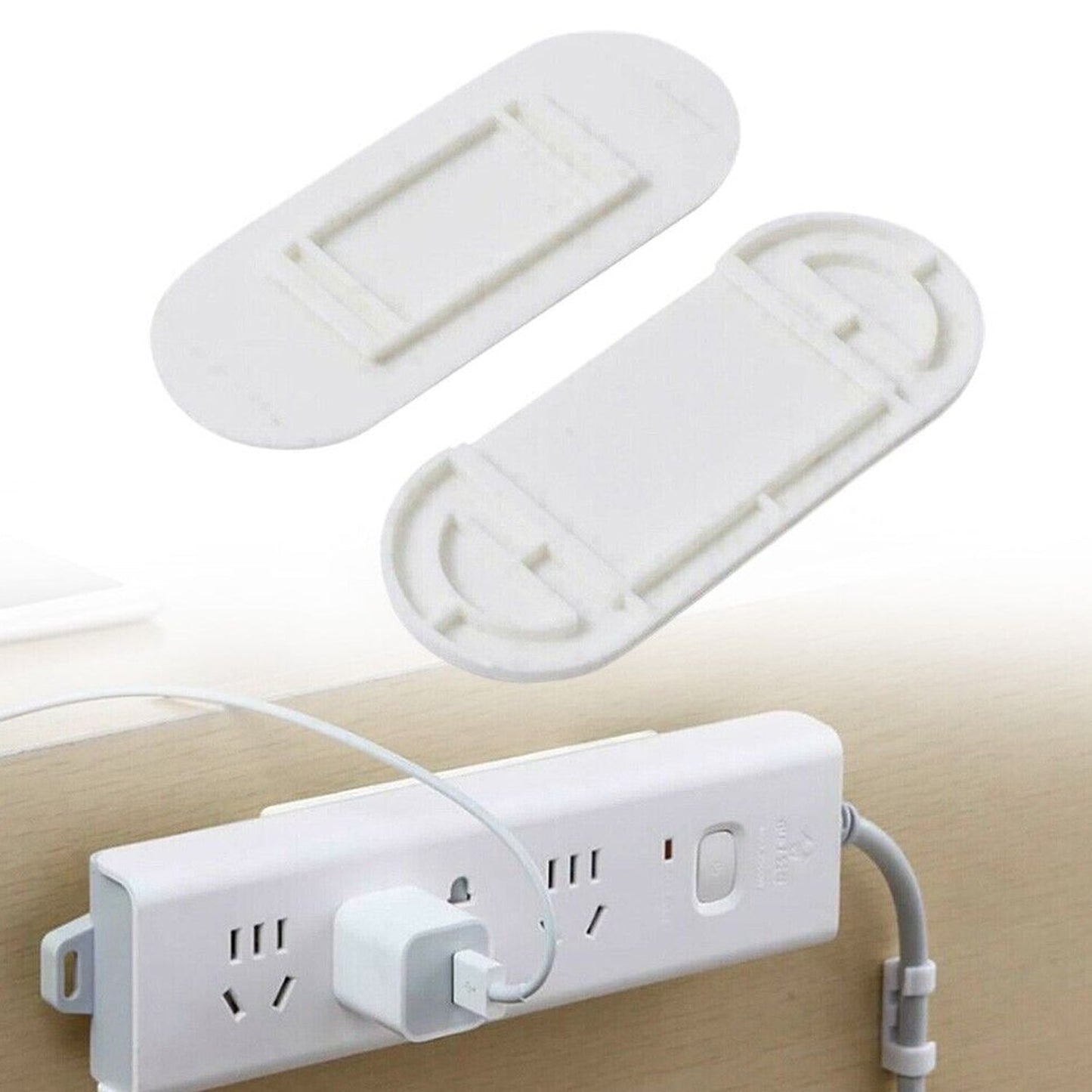 Self-adhesive wall mount for plug and power strip organization