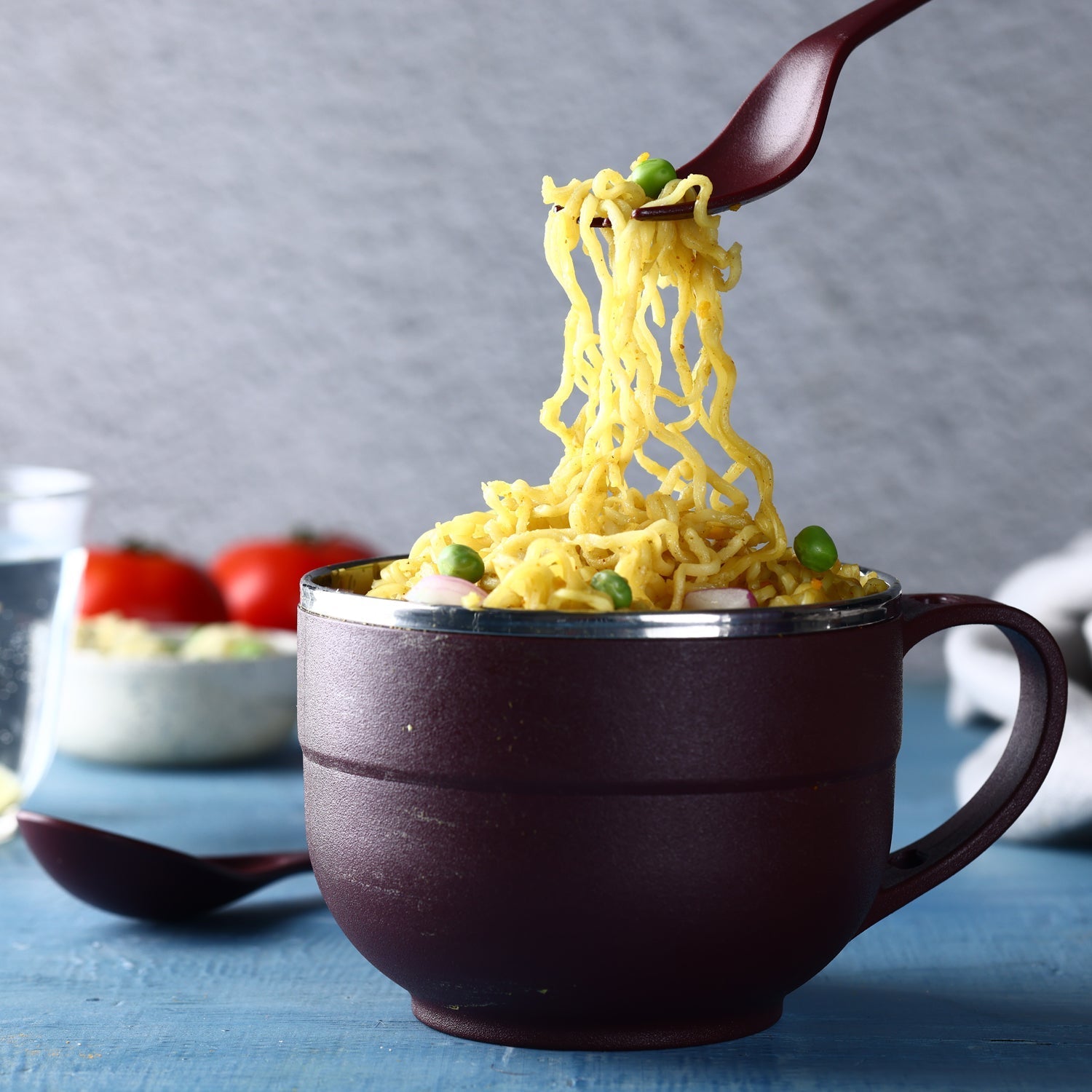 Stainless steel bowl with lid and spoon for versatile kitchen use