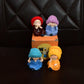 Decorative Resin Monk Buddha Showpiece Set of 4 with Traditional Straw Hats