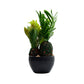 Artificial plant in a modern pot with green leaves