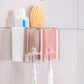 Wall-mounted bathroom organizer with toothbrush and toothpaste holder.