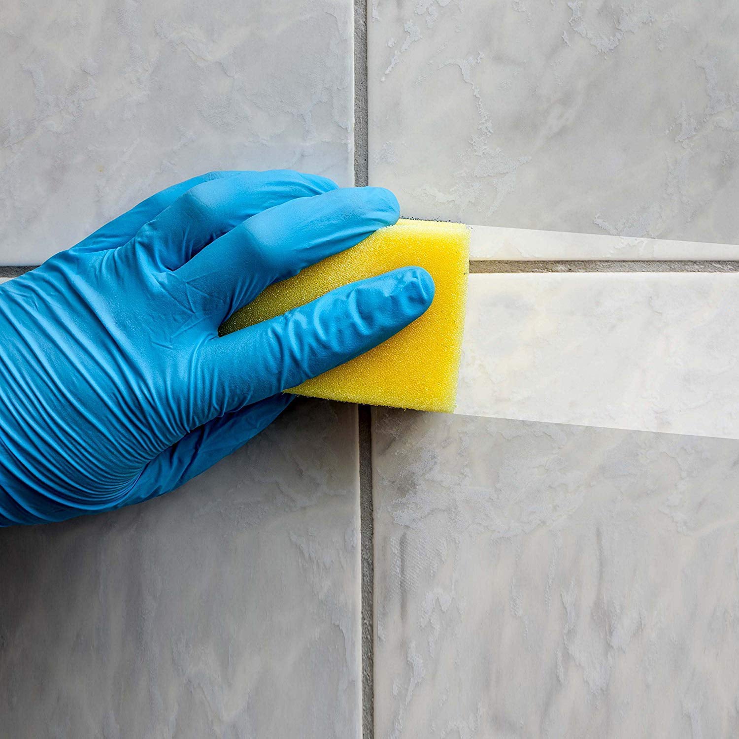 Durable scrub sponge, 2-in-1 design, perfect for cleaning kitchen and bathroom surfaces.