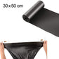 Large black garbage bags, environmentally friendly and durable.