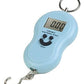 Mini digital weighing scale with LCD display.
