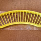 Banana slicer with handle for safe and efficient cutting.