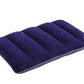 Comfortable blue velvet travel pillow.