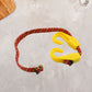 Bungee cord with plastic J hooks, perfect for securing luggage and items.