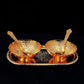 Elegant brass tray set with gold and silver plating, includes bowls and spoons in a velvet gift box.