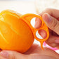 Ring-shaped peeler, snail design for oranges.