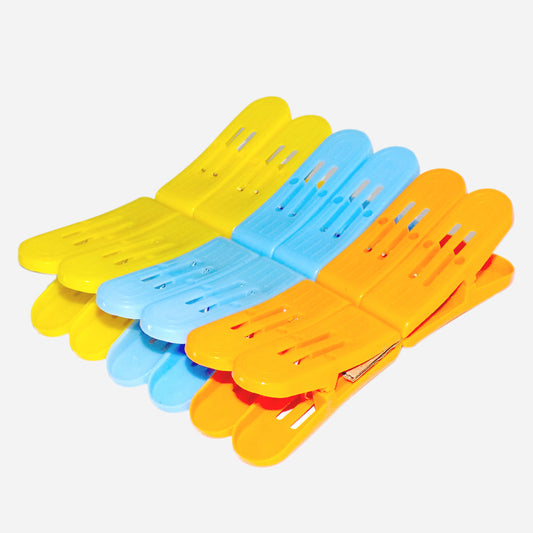 Double pin plastic clips in multicolour for strong cloth holding.