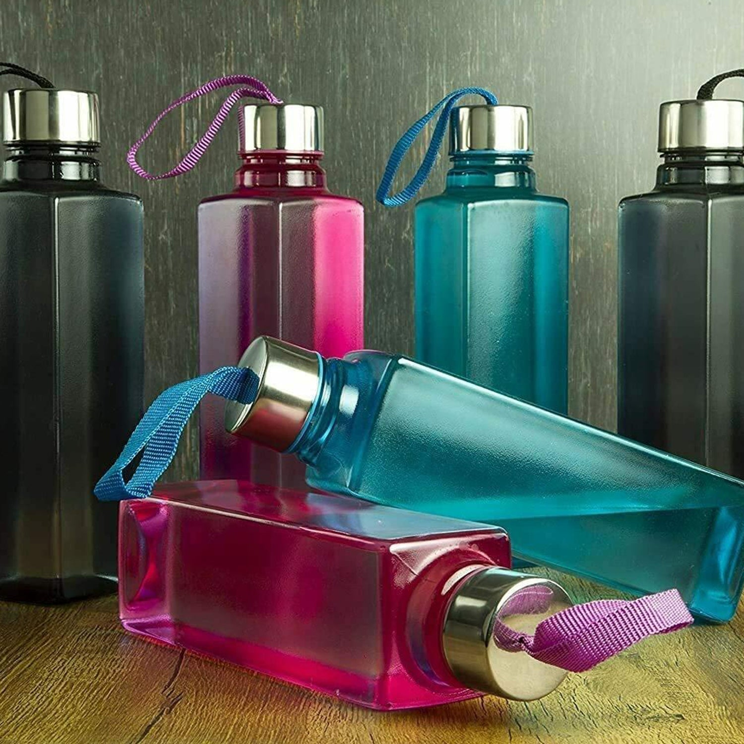 Collection of three square bottles, 1000ml each, perfect for beverage storage.