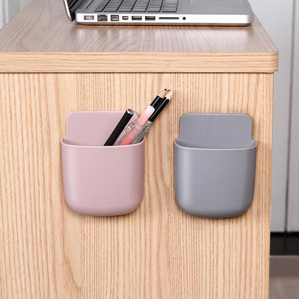 Storage case with phone charging holder.