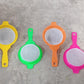 Versatile plastic strainer for juice and other liquids.