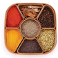 Multi-compartment masala box for organizing spices and herbs.