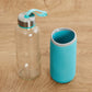 Stylish glass water bottle, 500 ml, with a protective cover.