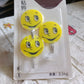 Smiley face self-adhesive wall hooks