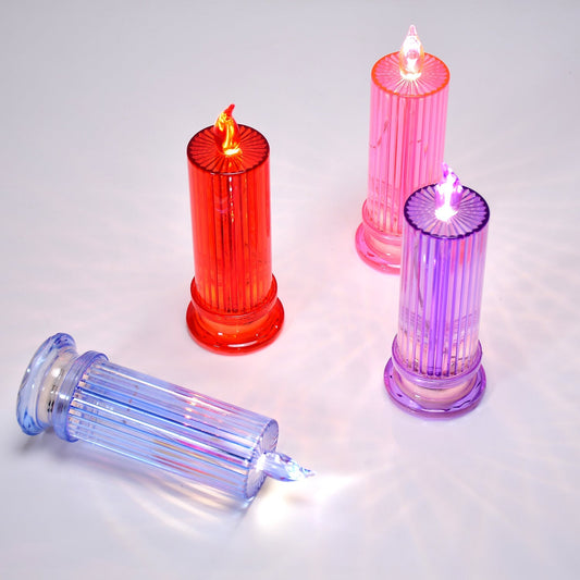 Multicolor candle lights with a decorative crystal design, ideal for enhancing home ambiance.