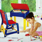 High-quality plastic study table and chair set in pink, includes a small box for pencils.