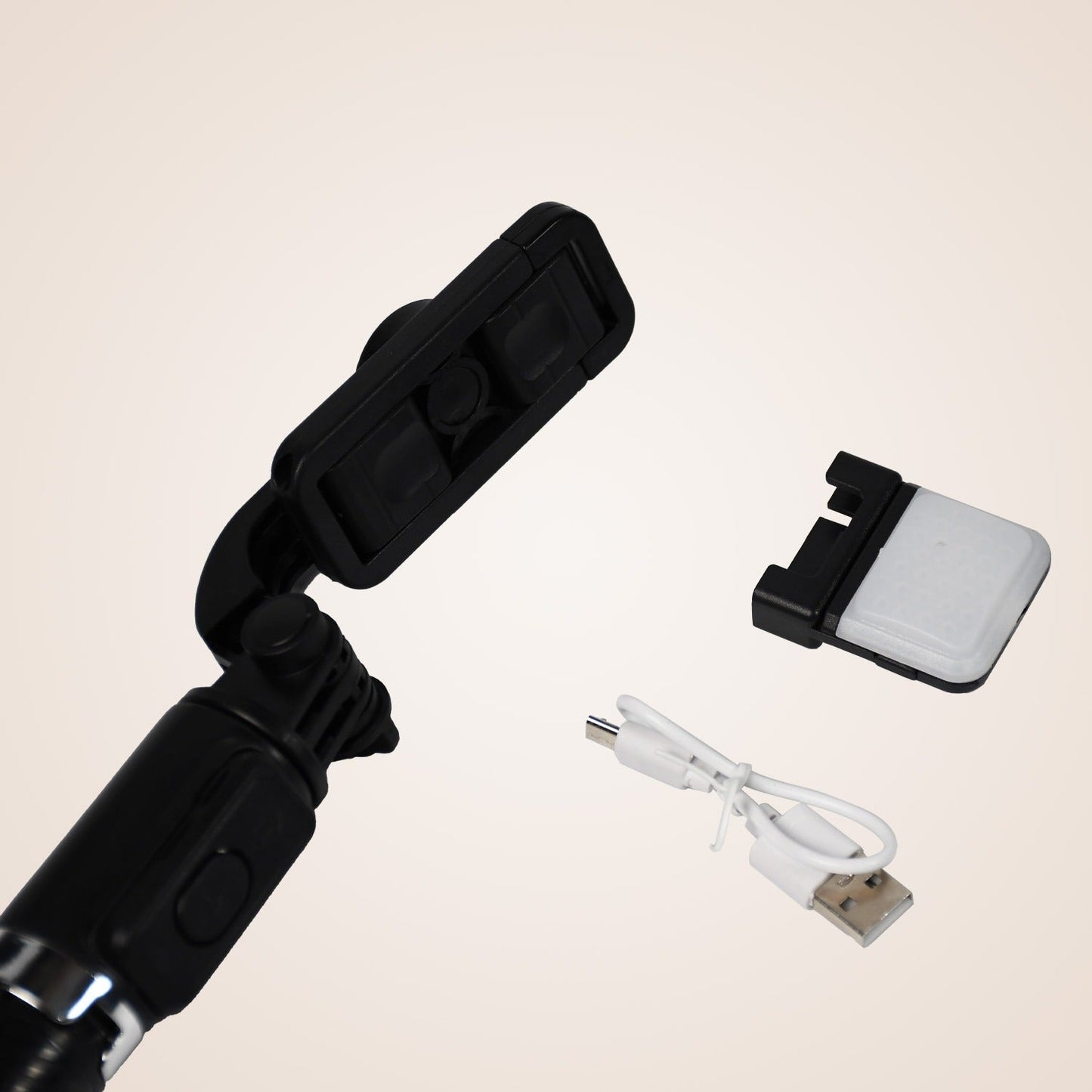 Compact selfie stick with a built-in Bluetooth remote for selfies