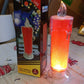 Close-up of the red LED candle, emphasizing its realistic and safe flame-like appearance.