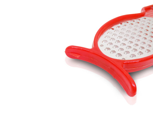 4-in-1 kitchen tool: peeler, slicer, grater, and cutter.