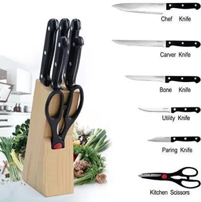 Black kitchen knives with scissors and wooden block