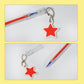 Red pen with star keychain