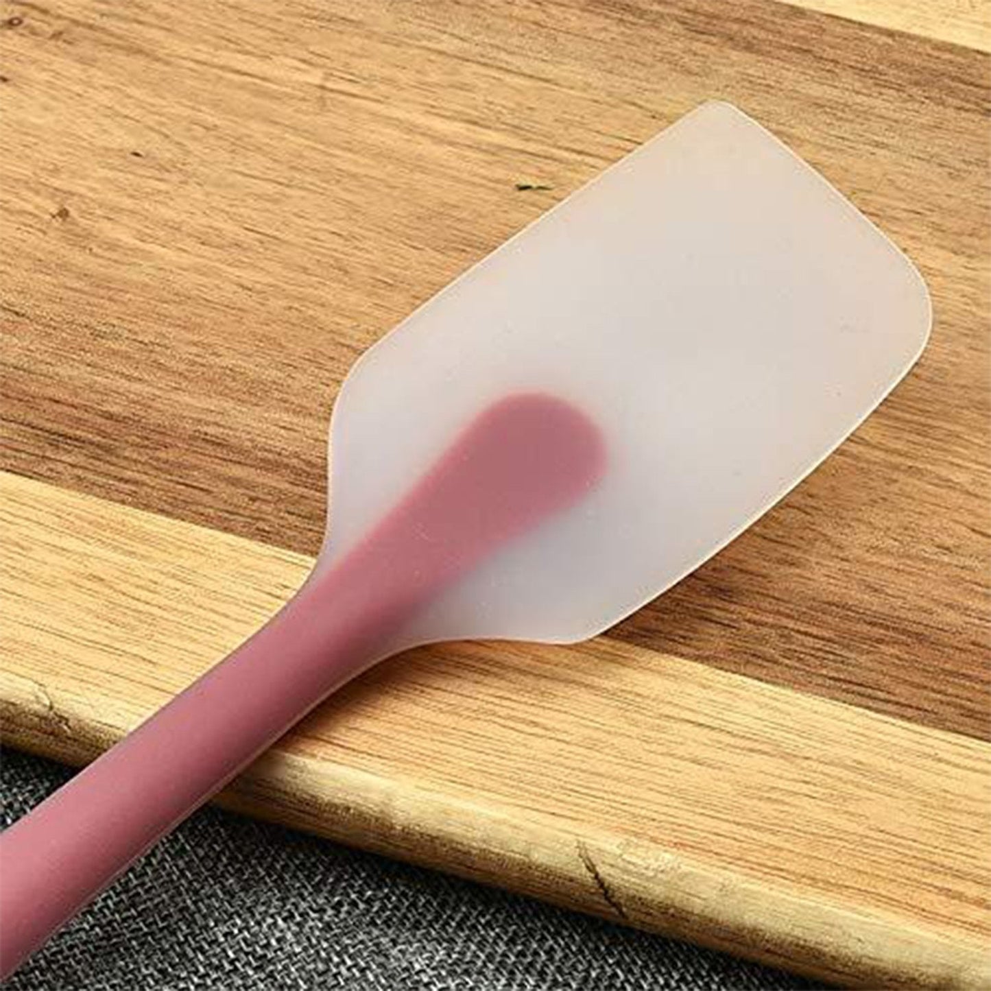 Close-up of the silicone spatula, highlighting its non-stick surface and color variety