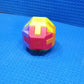 Activity cube with vibrant colors for children.