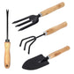 Gardening tools set with spade, rake, and trowel.