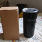 Stainless steel travel mug with lid, ideal for coffee and tea.