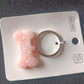Cute Bone-Shaped Acrylic Keychain with Stylish Typography