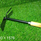 Complete view of double hoe gardening tool with wooden handle.