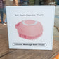 Massage bath body brush with silicone bristles and easy-to-use shampoo dispenser.